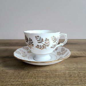 Colcloug Bone China England vintage porcelain footed tea cup and saucer.